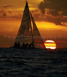 Melges 24 racing in the sunset