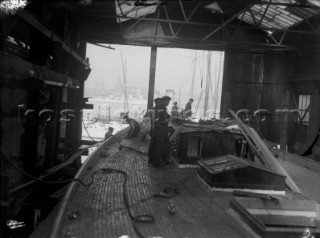 Laying the deck on a large yacht (possibly J-Class Shamrock) in the 1930s