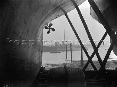 View under a large yacht keel and propeller in Camper and Nicholsons yard in Gosport in 1930