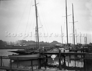 Yachts alongside at Mays yard in Lymington UK (now known as Berthons) in 1936