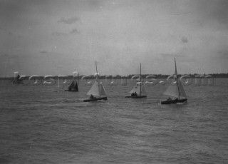 Int 14 dinghy racing off Cowes in the Solent,  sail numbers 111 and 177 visible
