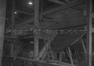 Boat in a shed at Mays Yard in Lymington (now known as Berthons)  in 1936
