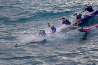 Canoe with outrigger racing, Hamilton Island, Australia.