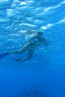 Snorkeling off Honeymoon Island, Cook Islands, South Pacific.
