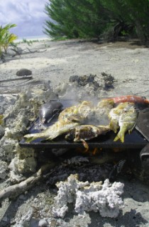 Fresh fish cooked on Honeymoon Island, Cook Islands, South Pacific.