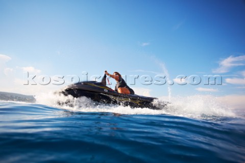 Man jet skiing in the mediterranean sea