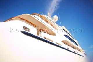 Woman standing on deck of a superyacht