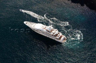 Aerial view of a superyacht and tenders and toys in the mediterranean sea
