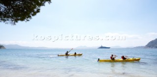 People kayaking in the mediterranean sea.
