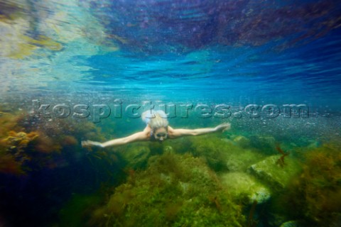 Woman swimming nderwater