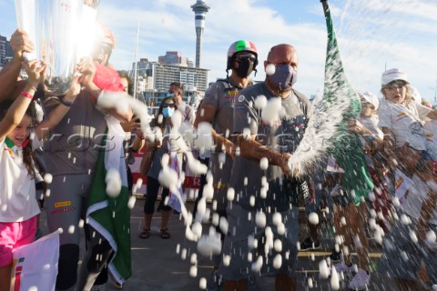Champagne celebration Prada crew celebrate winning the Prada Cup Challenger Series