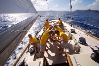 The crew onboard W-Class yacht Wild Horses work together during a race near Saint Bartholomew, French West Indies.