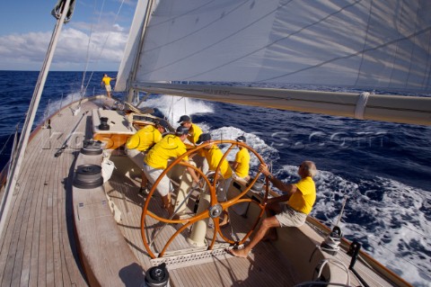 The crew onboard WClass yacht Wild Horses work together during a race near Saint Bartholomew French 