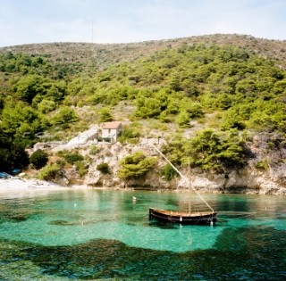 Crystal clear water in a bay on the island of Bisevo, Croatia