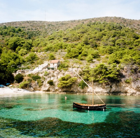 Crystal clear water in a bay on the island of Bisevo Croatia
