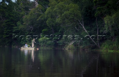 Fly Fisherman casting his fly to a musky on the Flambeau River
