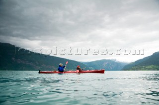 Sea kayaking on the turquoise waters of Norways largest fjord, the Sognefjord.