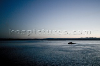 Fishing boat on the Pacific ocean near Washington at sunset.