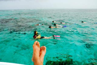 Snorkeling in Belize central america. ( CIA Productions / Aurora Photos )