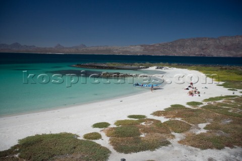 A group of tourists from Loreto bask in the sun and have lunch on nearby  Isla Cornado Sea of Cortez