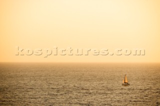 A sailing yacht cruising at sunset on an autumn evening off the coast of Palos Verdes, California. Ty Milford/Aurora Photos/Kos Pictures