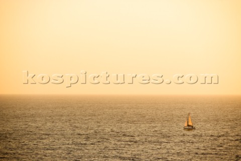 A sailing yacht cruising at sunset on an autumn evening off the coast of Palos Verdes California Ty 